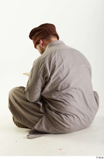 Luis Donovan Afgan Reading Book reading sitting whole body 0005.jpg